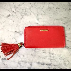 Poppy red Stella & Dot wallet/clutch with tassel
